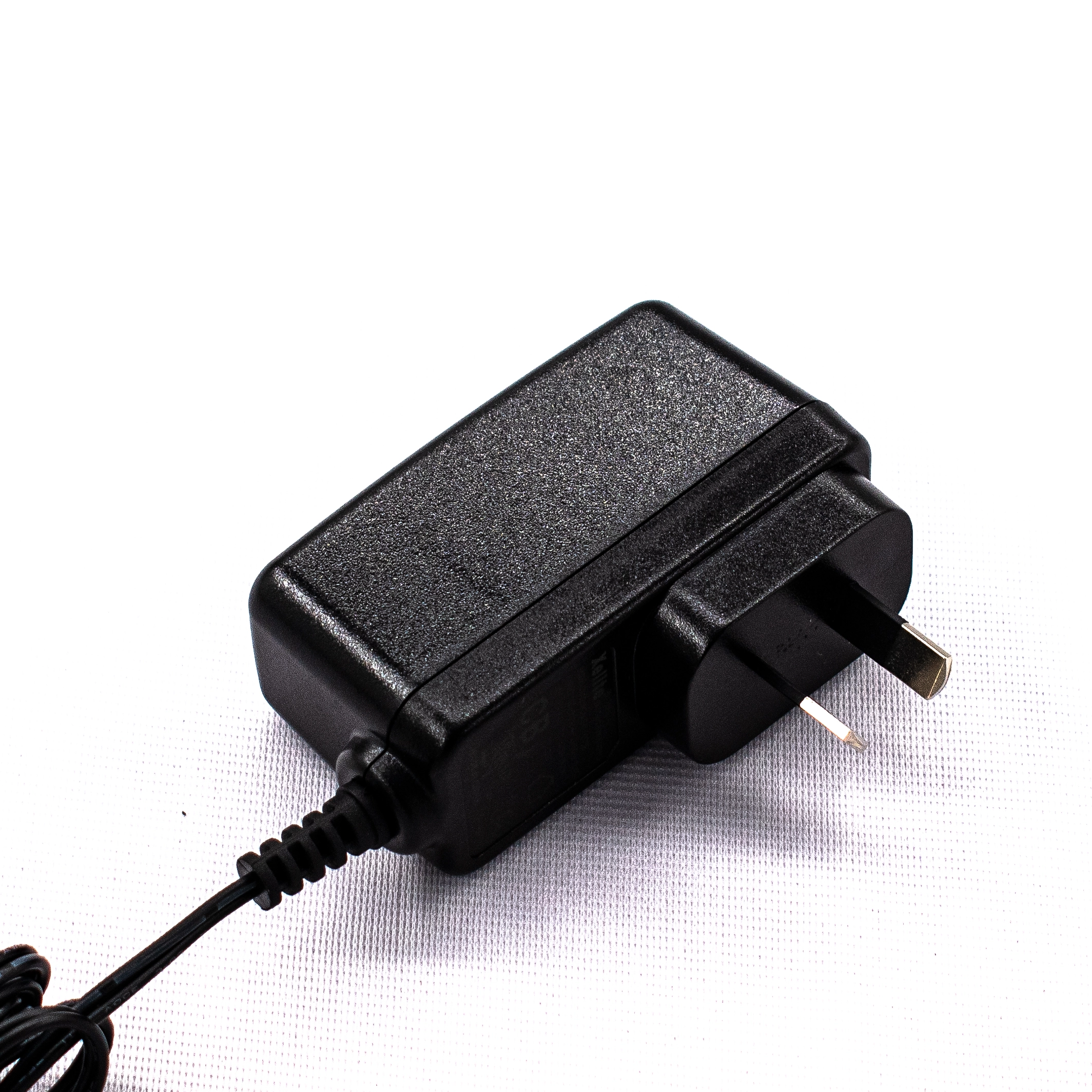 The 18 watts side switching power adapter: "A Slim Profile, Big on Performance"